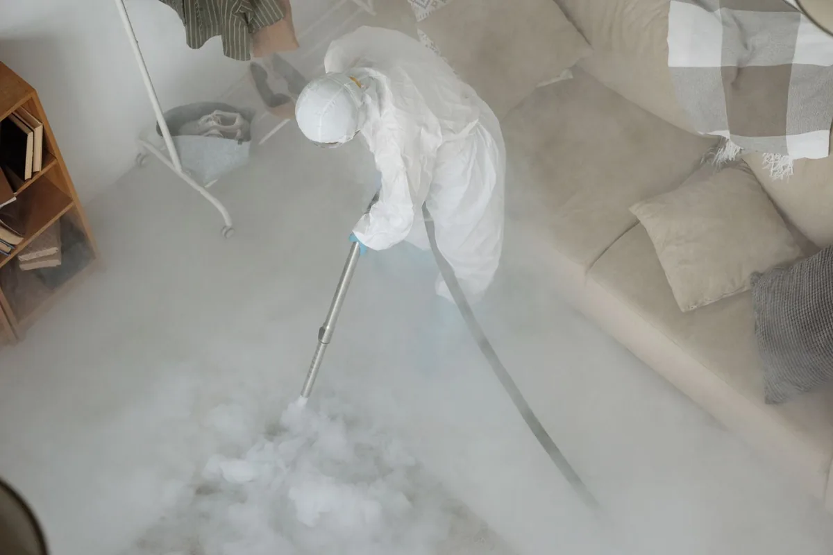 Biohazard cleanup technician in protective equipment, Tyler Run, PA